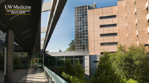 zoom background of a photo of the Montlake Campus with white and yellow UW Medical Center logo